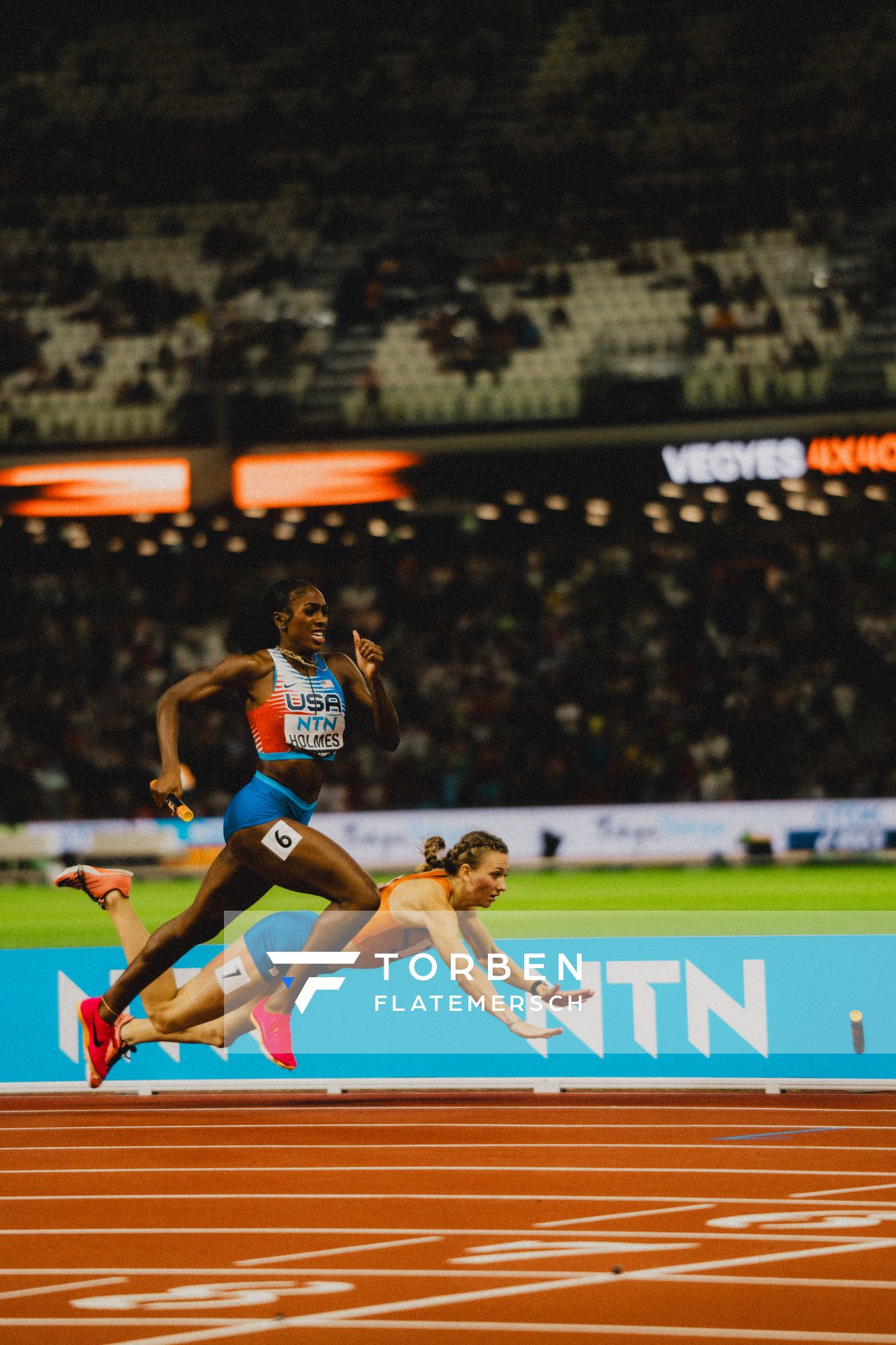 Femke Bol (NED/Netherlands), Alexis Holmes (USA/United States) during the 4x400 Metres Mixed Relay during day 1 of the World Athletics Championships Budapest 23 at the National Athletics Centre in Budapest, Hungary on August 19, 2023.