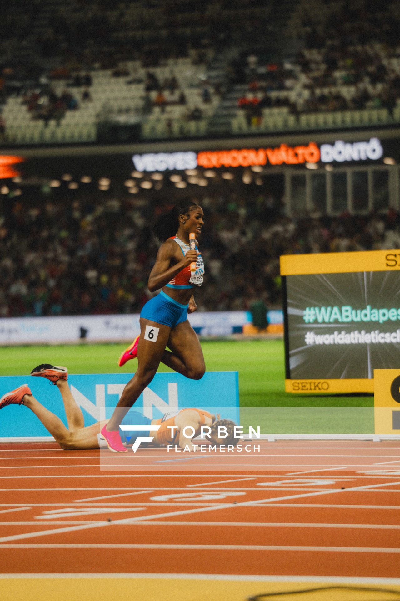 Femke Bol (NED/Netherlands), Alexis Holmes (USA/United States) during the 4x400 Metres Mixed Relay during day 1 of the World Athletics Championships Budapest 23 at the National Athletics Centre in Budapest, Hungary on August 19, 2023.